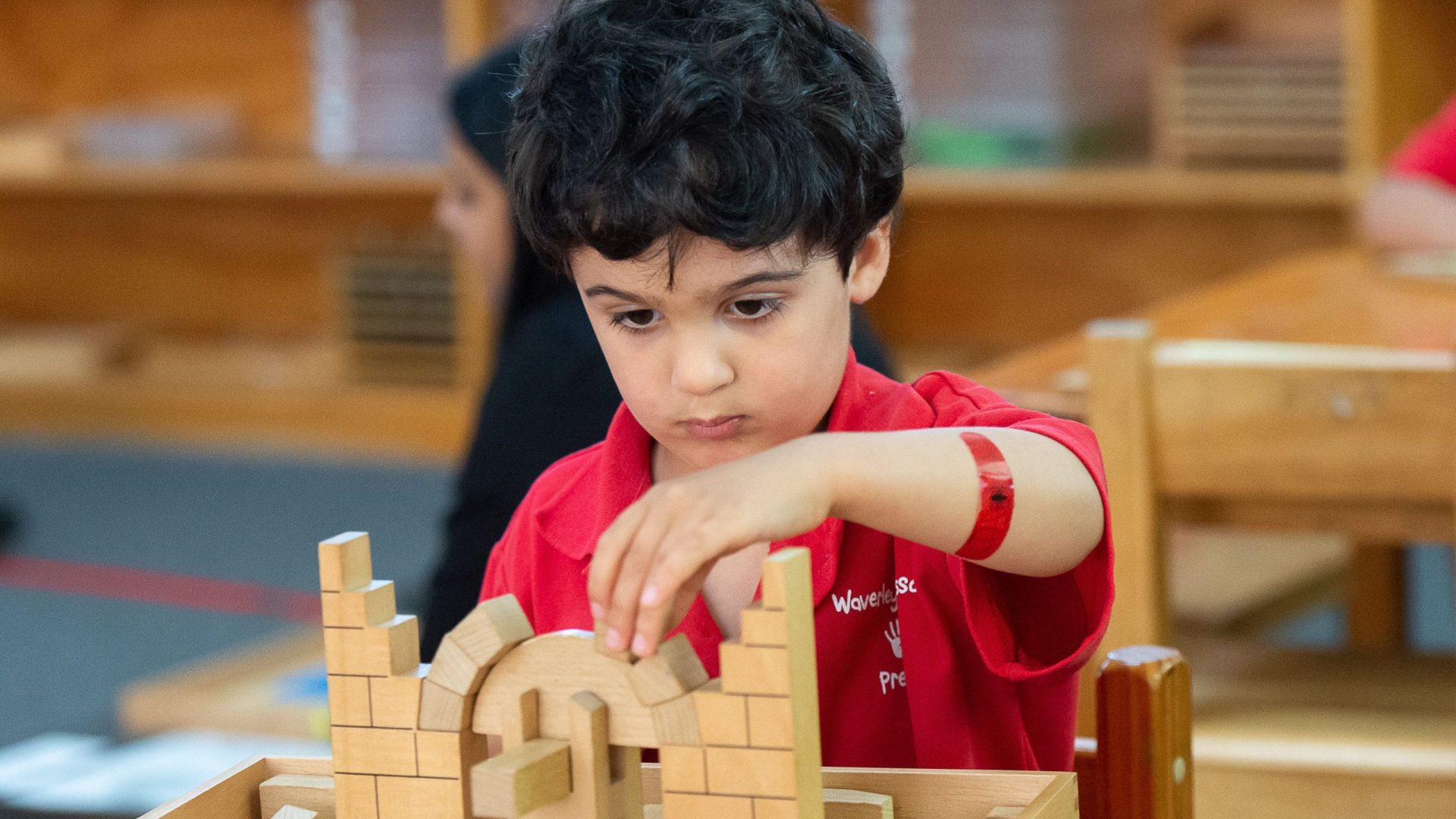 School child building blocks
